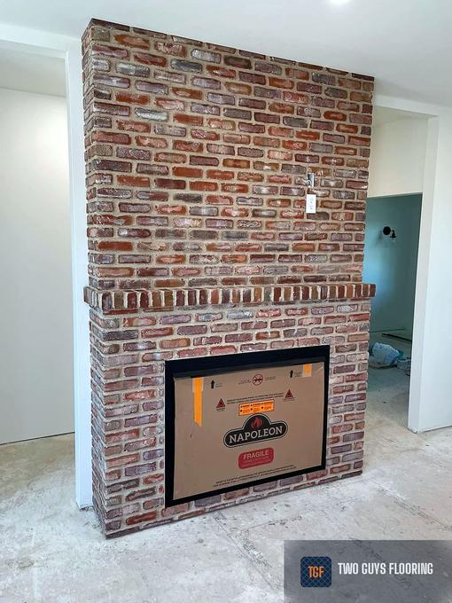 Floor-to-ceiling brick fireplace